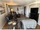 Relaxing living room with comfortable seating and a large TV at 4065 E University Dr # 373, Mesa, AZ 85205