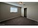 Bright bedroom with neutral walls and carpet at 5801 N 23Rd Ave, Phoenix, AZ 85015