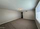 Bright living room with neutral walls and carpet at 5801 N 23Rd Ave, Phoenix, AZ 85015