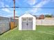 Gray storage shed in the backyard at 6826 W Pierson St, Phoenix, AZ 85033