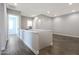 Upstairs hallway with dark hardwood floors and neutral walls at 6922 E Orion Dr, Scottsdale, AZ 85257