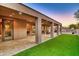 Covered patio with access to backyard and mountain views at 10030 N 23Rd St, Phoenix, AZ 85028