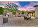 Outdoor kitchen and patio area with seating at 10030 N 23Rd St, Phoenix, AZ 85028