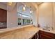 Wet bar with a view into the living room at 10030 N 23Rd St, Phoenix, AZ 85028