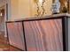 Elegant home bar with onyx backlighting and sleek metal accents at 10030 N 23Rd St, Phoenix, AZ 85028