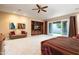 Main bedroom with built-in entertainment center at 10030 N 23Rd St, Phoenix, AZ 85028