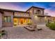 Elegant home exterior with stone and stucco detailing at 10030 N 23Rd St, Phoenix, AZ 85028