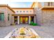 Inviting entrance with a stone facade, and water feature at 10030 N 23Rd St, Phoenix, AZ 85028