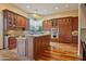 Large kitchen with island, hardwood floors and ample cabinetry at 10030 N 23Rd St, Phoenix, AZ 85028