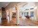 Open concept living area with hardwood floors and large windows at 10030 N 23Rd St, Phoenix, AZ 85028