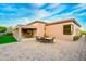 Outdoor patio with seating area and artificial turf at 10030 N 23Rd St, Phoenix, AZ 85028