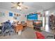 Living room with painted wall, TV, and desk at 11228 N 34Th Ave, Phoenix, AZ 85029