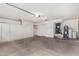 Spacious garage with ample storage and built in shelving at 12838 S 40Th Pl, Phoenix, AZ 85044