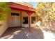 Covered entryway with double doors and side windows at 12838 S 40Th Pl, Phoenix, AZ 85044