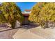Front entrance with double doors and mature landscaping at 12838 S 40Th Pl, Phoenix, AZ 85044
