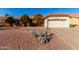 Single-story home with attached garage and desert landscaping at 12838 S 40Th Pl, Phoenix, AZ 85044