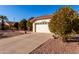 Front view of a single-story house with a two-car garage at 12838 S 40Th Pl, Phoenix, AZ 85044