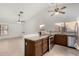 Kitchen with granite countertops and wood cabinets at 12838 S 40Th Pl, Phoenix, AZ 85044