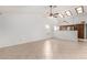 Open living room with tile floors and kitchen passthrough at 12838 S 40Th Pl, Phoenix, AZ 85044