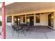 Covered patio with seating area and views of the backyard at 12838 S 40Th Pl, Phoenix, AZ 85044