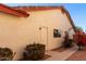 Side yard with a pathway and lush, flowering bushes at 12838 S 40Th Pl, Phoenix, AZ 85044