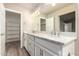 Bathroom with double vanity, granite countertop and large mirror at 16205 N Zane Grey Ln Ln, Fountain Hills, AZ 85268