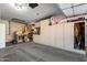 Organized garage with ample storage and workbench at 17221 N Thornberry Dr, Surprise, AZ 85374