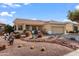 Single-story home with a two-car garage and desert landscaping at 17221 N Thornberry Dr, Surprise, AZ 85374