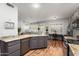 Kitchen boasts granite countertops and modern appliances at 17221 N Thornberry Dr, Surprise, AZ 85374