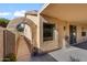 Pathway leads to a private side yard with arched entry at 17221 N Thornberry Dr, Surprise, AZ 85374