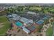 Aerial view of community amenities including pool, tennis courts, and clubhouse at 18048 W Spencer Dr, Surprise, AZ 85374