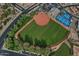 Aerial view of a community baseball field and pickleball courts at 18048 W Spencer Dr, Surprise, AZ 85374