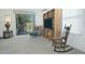 Living room with sliding door access to backyard patio at 18048 W Spencer Dr, Surprise, AZ 85374