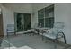 Patio with table and chairs, offering an outdoor space at 18048 W Spencer Dr, Surprise, AZ 85374
