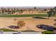 Aerial view of home's backyard and golf course at 18435 N 125Th Ave, Sun City West, AZ 85375