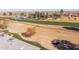 Aerial view of home's backyard and golf course at 18435 N 125Th Ave, Sun City West, AZ 85375