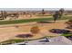 Aerial view of home's backyard and golf course at 18435 N 125Th Ave, Sun City West, AZ 85375