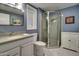 Bathroom with a shower and a white vanity at 18435 N 125Th Ave, Sun City West, AZ 85375