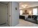 Bright bedroom with a king-size bed and an ensuite bathroom at 18435 N 125Th Ave, Sun City West, AZ 85375