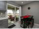 Kitchen with breakfast bar and view of screened patio at 18435 N 125Th Ave, Sun City West, AZ 85375