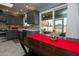 Kitchen with breakfast bar and view of screened patio at 18435 N 125Th Ave, Sun City West, AZ 85375