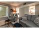 Living room with comfortable seating and view to kitchen at 18435 N 125Th Ave, Sun City West, AZ 85375