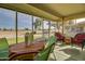 Spacious patio with seating area and golf course view at 18435 N 125Th Ave, Sun City West, AZ 85375