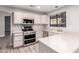 Kitchen with stainless steel appliances and light wood cabinets at 20206 N 32Nd Pl, Phoenix, AZ 85050