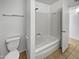 Clean bathroom with shower/tub combo and tile flooring at 3007 W Redfield Rd, Phoenix, AZ 85053