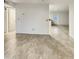 Open living room with view into kitchen and tile flooring at 6407 W Vogel Ave, Glendale, AZ 85302