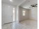 Bright entryway with tile flooring and a white door at 688 W Carlsbad Dr, San Tan Valley, AZ 85140