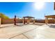 Large backyard with pergola and concrete patio at 7409 S 12Th Ave, Phoenix, AZ 85041