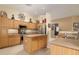 Well-equipped kitchen with stainless steel appliances and an island at 7782 E Wildcat Dr, Gold Canyon, AZ 85118