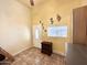 Bright entryway with tiled floor, storage, and access to other rooms at 795 S Cinnabar Dr, Apache Junction, AZ 85119